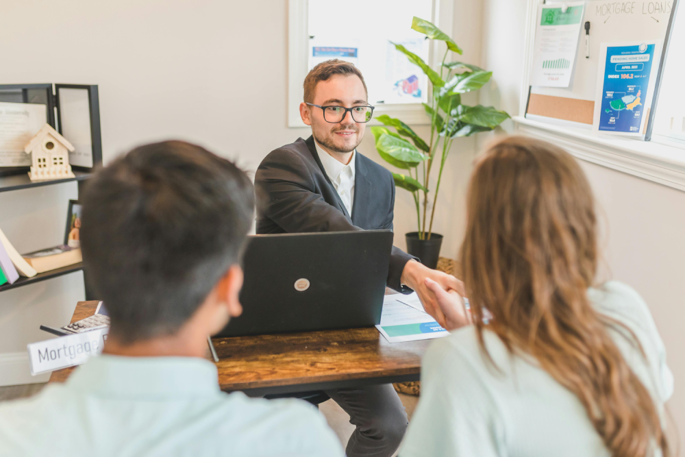 Friendly financial advisor helping client
